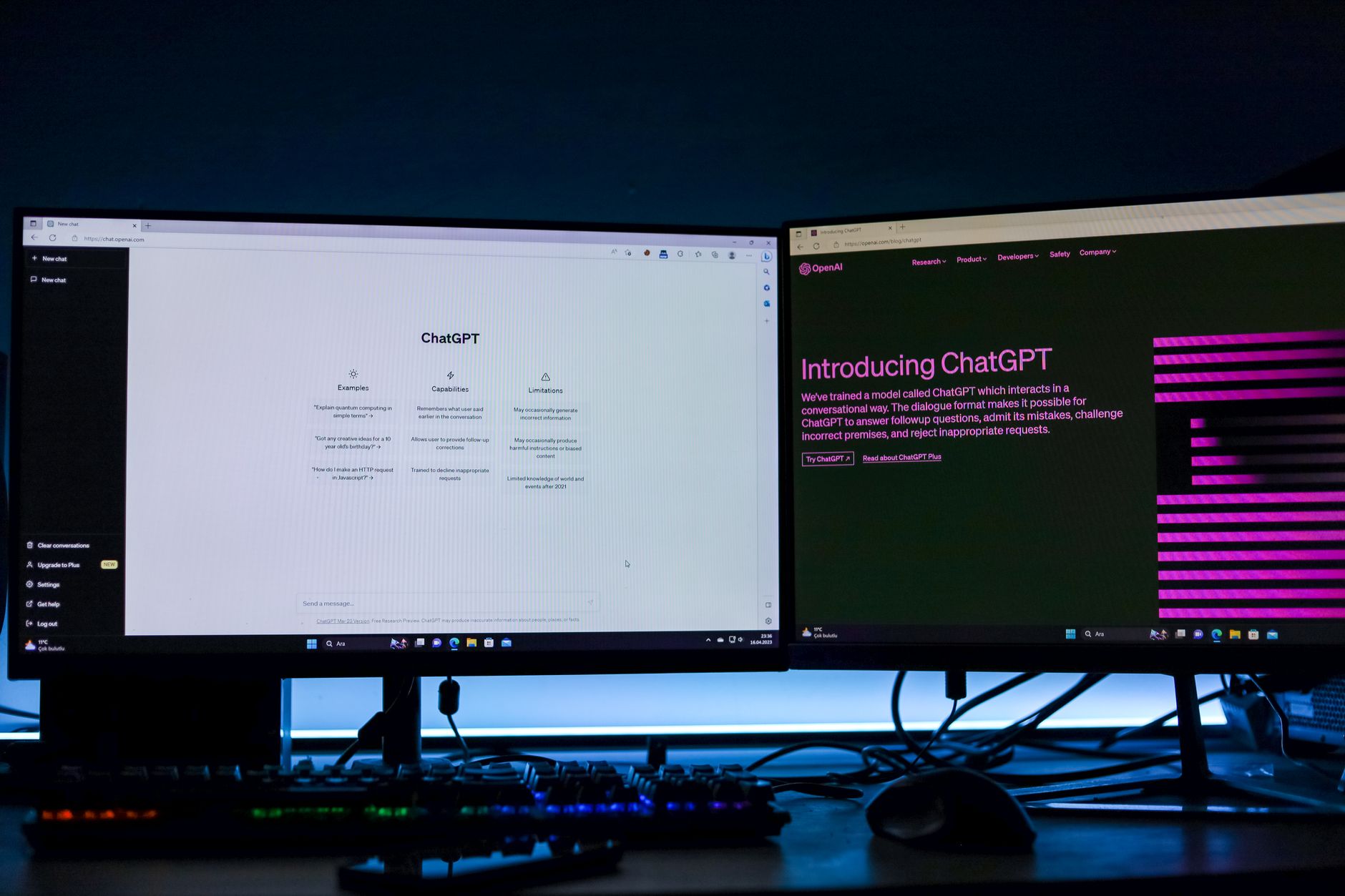 Person comparing two AI chat windows on a large monitor