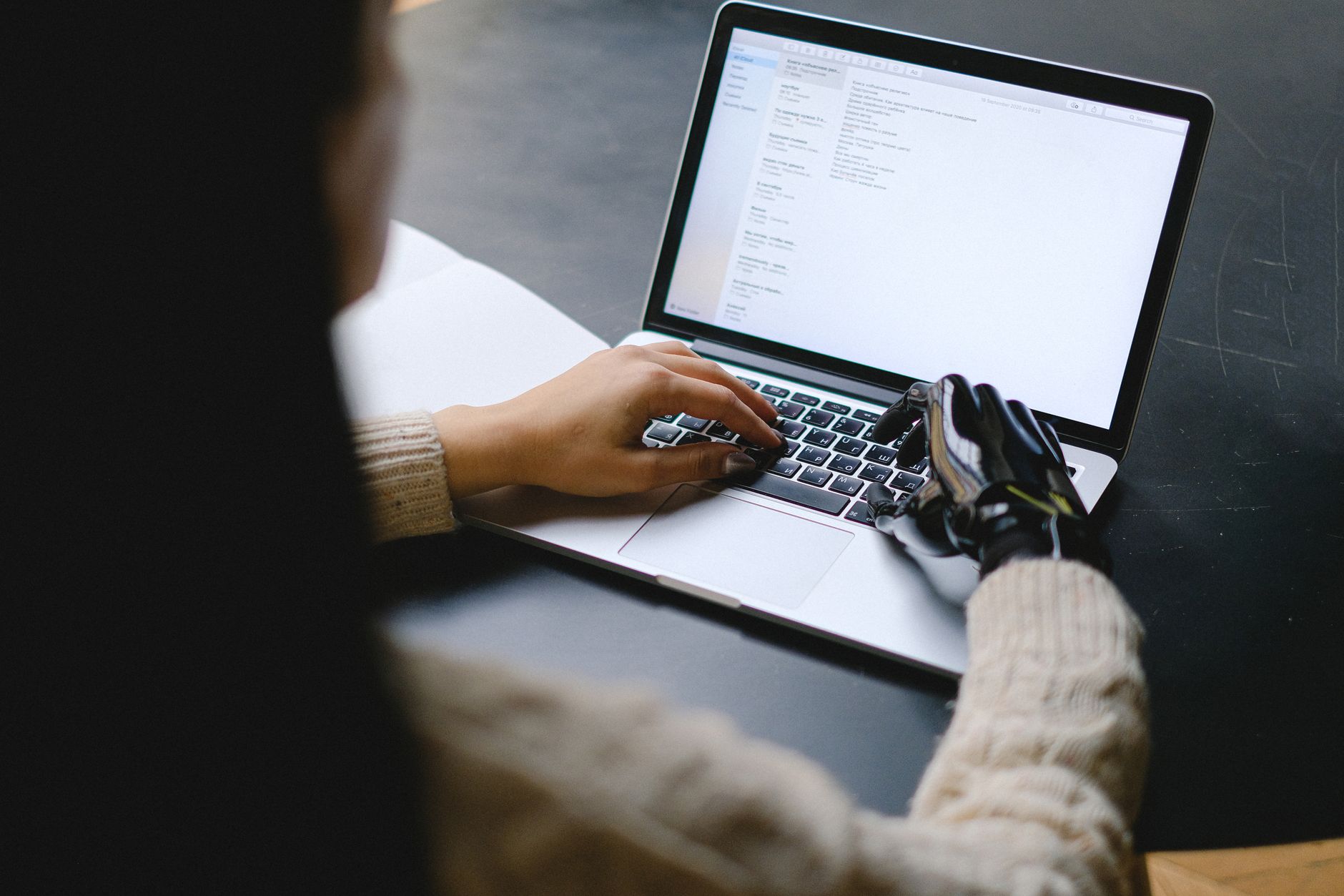 Laptop screen with Notion AI writing in a workspace